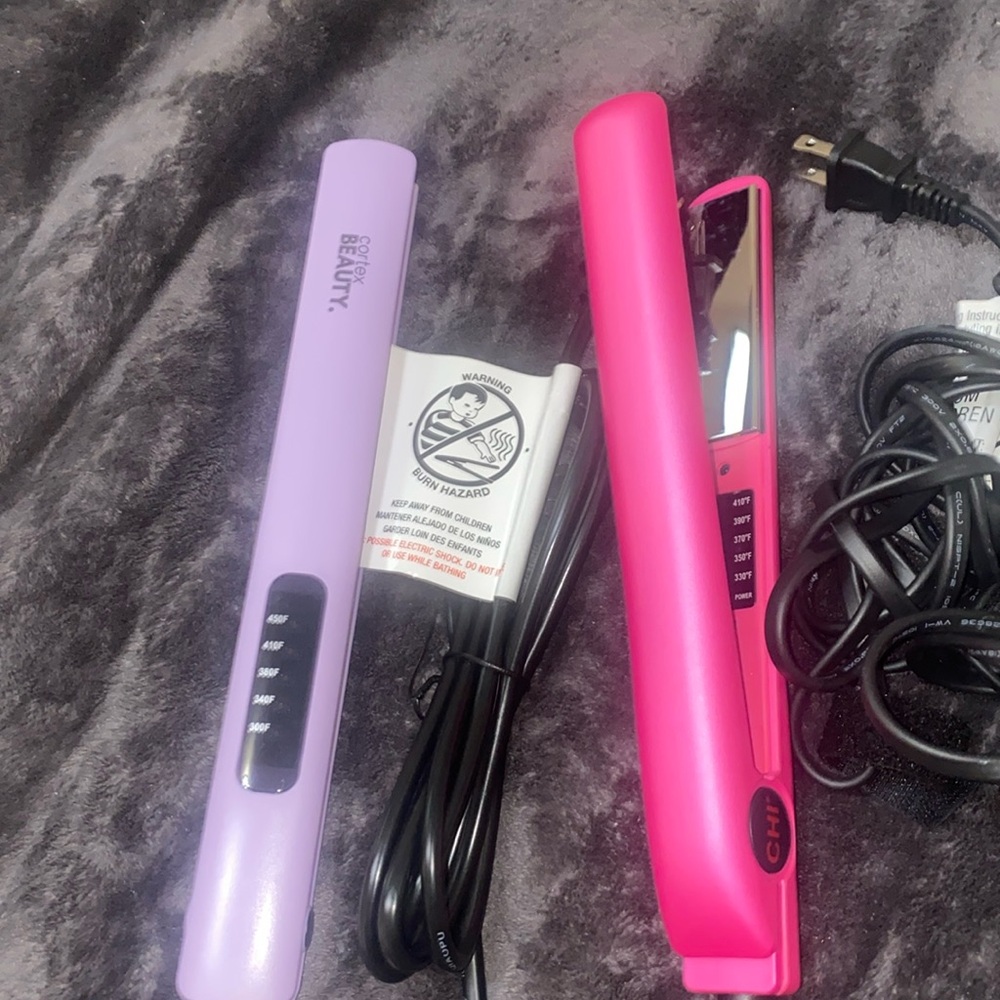 2 straighteners,never been used, pink and purple color, wide use, and thin use.